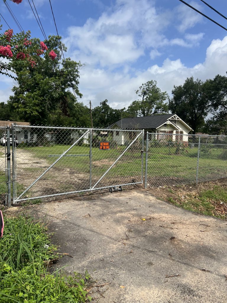 Installing a Chain Link Fence for Waylon Hinze in Galveston Texas