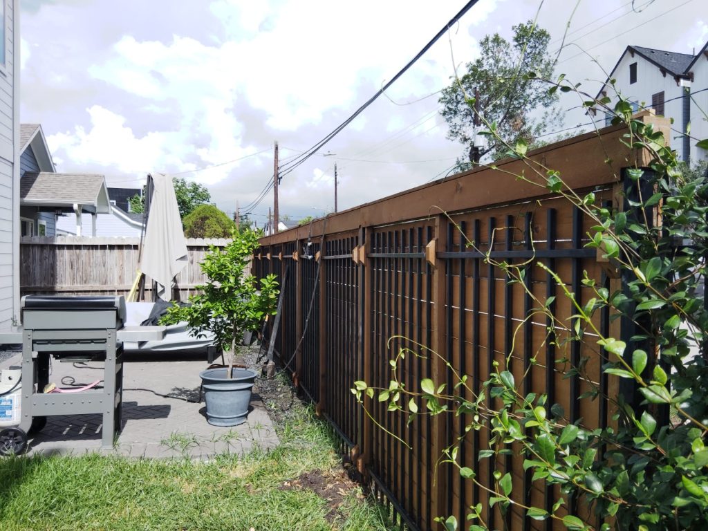 Repairing 49-Foot Wood + Iron Fence in Danbury Texas