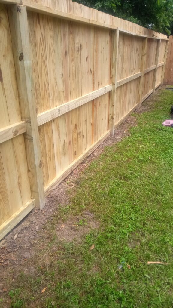 Close-up of cedar wood fence panel and post detail
