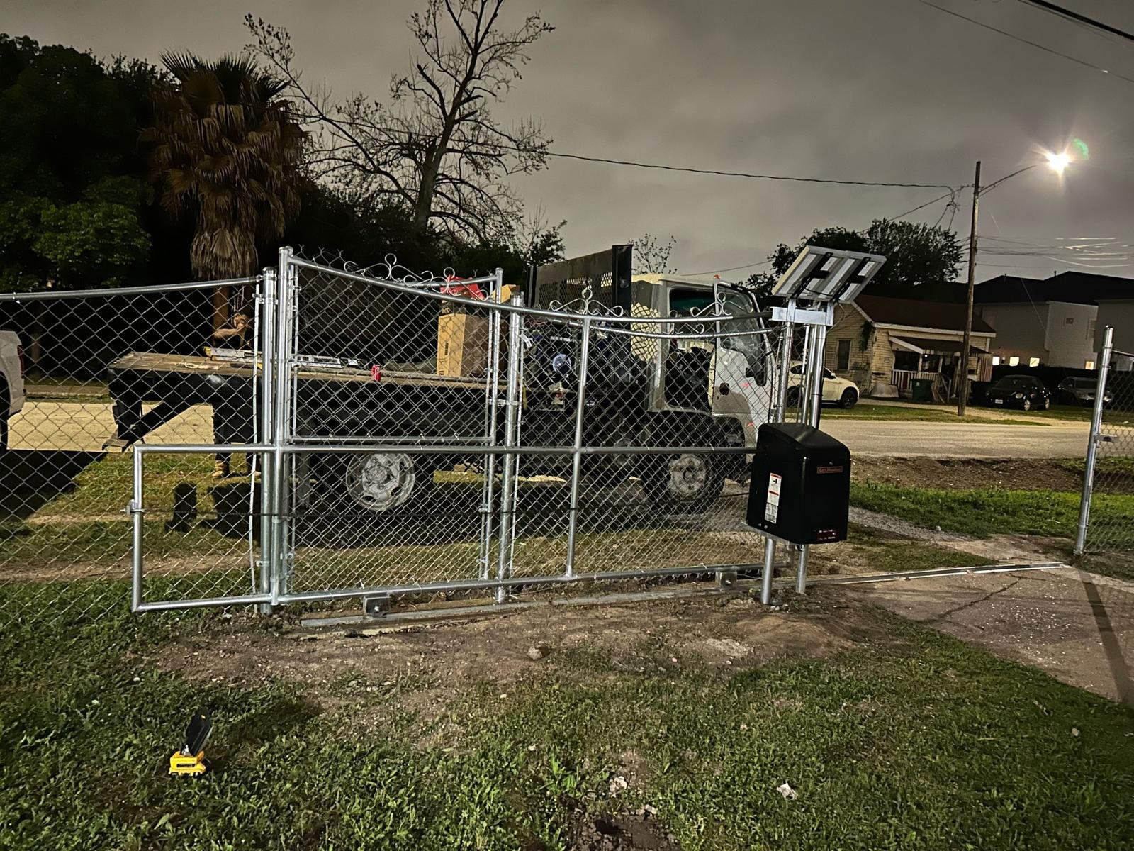 Automatic chain link driveway gate installation