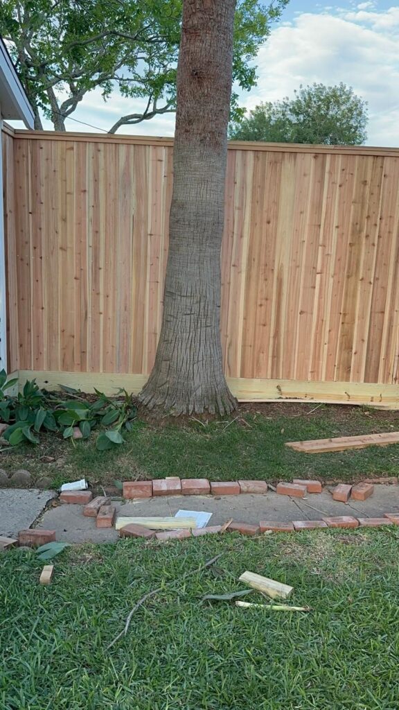 Front yard picket-style wood fence