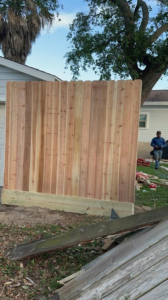 Wood fence along a shared property line between neighbors