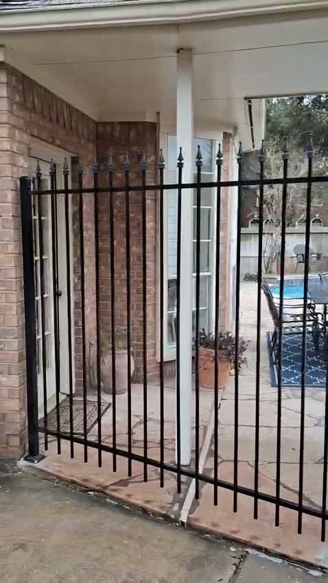 Black iron pool safety gate, Galveston County