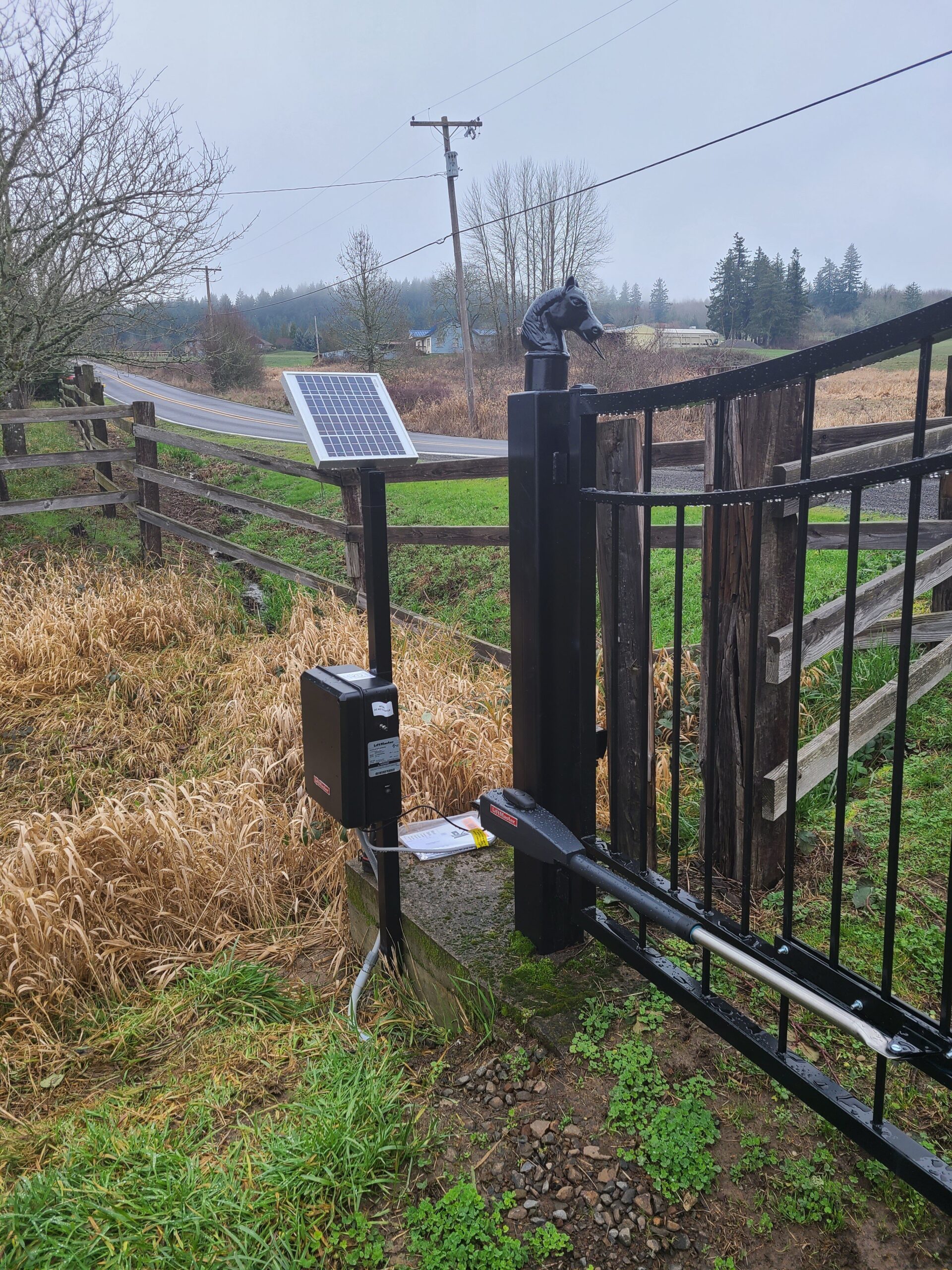 Solar-powered automatic driveway gate installed at a Galveston-area home