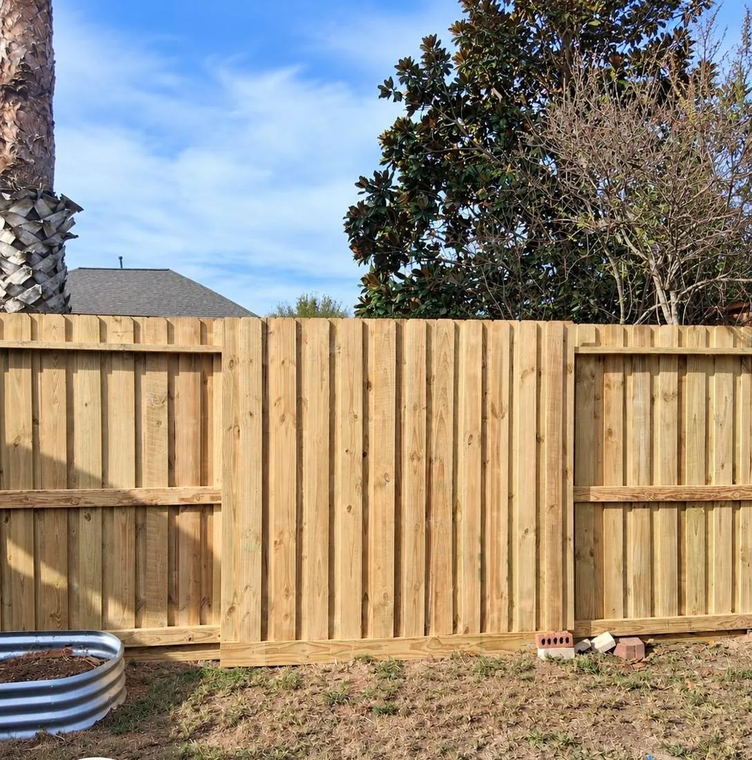 Inside view of a wood fence and gate